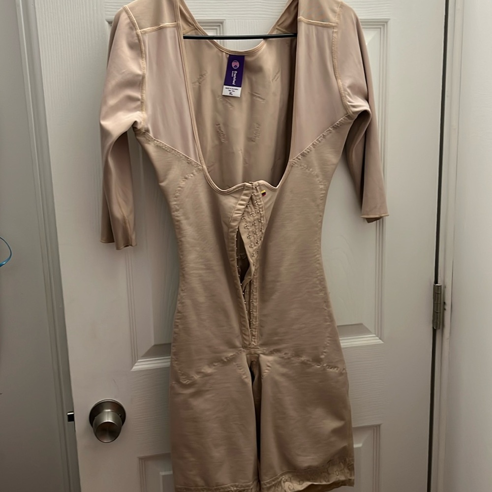 Beige girdle in a size XL made in Columbia.